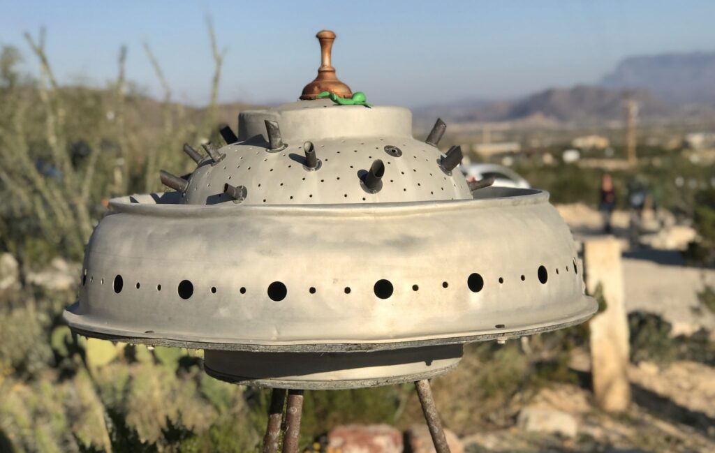 Old rusty UFO sculpture in a desert ghost town